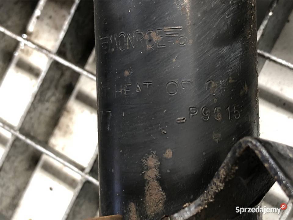 AMORTYZATOR LEWY PRZÓD ZE SPRĘŻYNĄ RENAULT CLIO