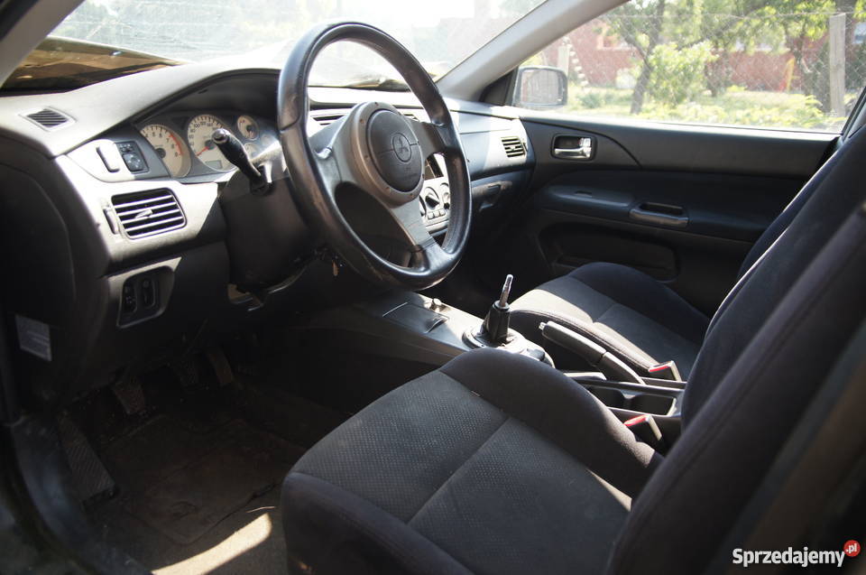 Deska rozdzielcza konsola Lancer VII Kombi 0305