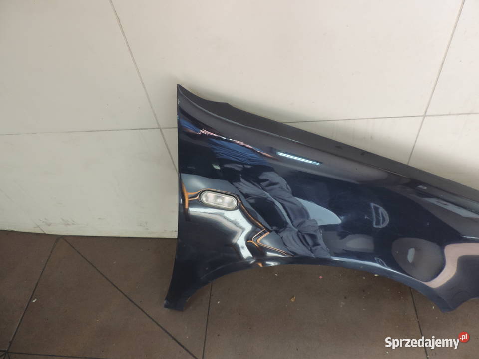 VW GOLF 4 IV BŁOTNIK PRAWY PRZÓD