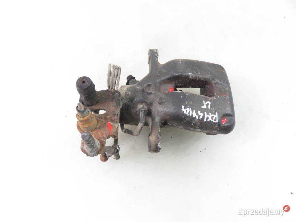 ZACISK LEWY TYŁ VW CADDY III osobowe