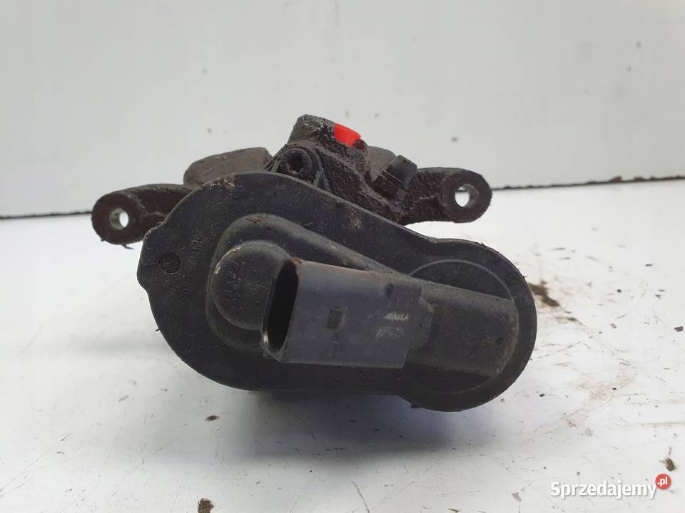 VW Passat B7 TYLNY ZACISK HAMULCOWY prawy tył osobowe Chełm