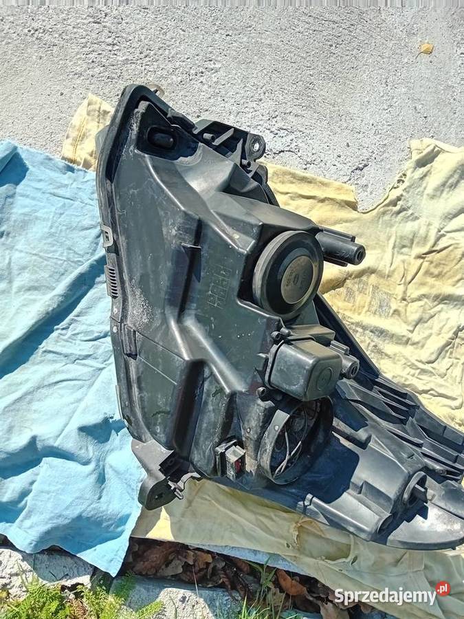 Lampy przód Opel Astra H