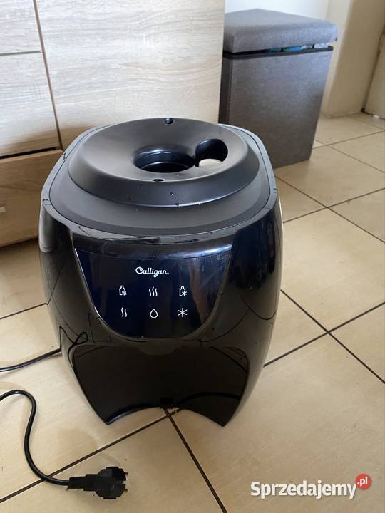 Dystrybutor wody Culligan TOUCH HC03 3 butle sprzedam