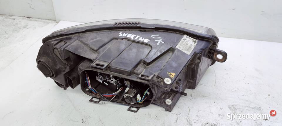 REFLEKTOR LEWY AUDI A6 C6 4F0941003BC SKRĘTNY UK Lampy przednie Przystajń
