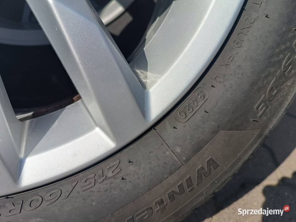 Oryginalne alufelgi VW z oponami zimowymi 16