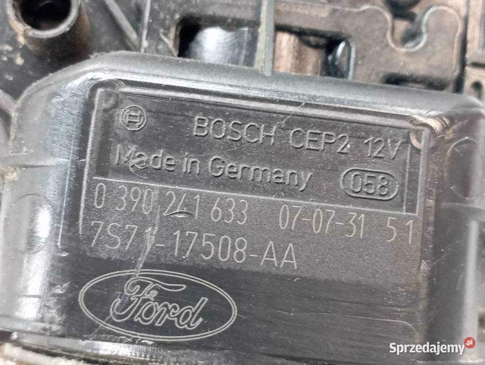 MECHANIZM WYCIERACZEK PRZÓD EUROPA 7S7117K484AB