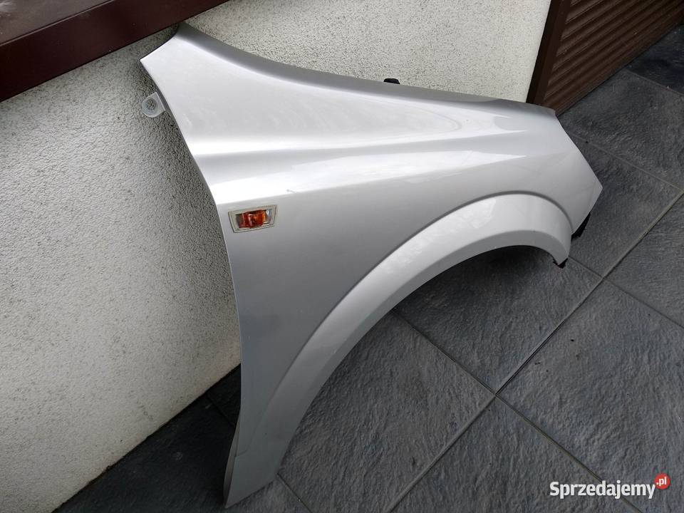 Opel Astra H błotnik przedni lewy srebrny Z157 łódzkie