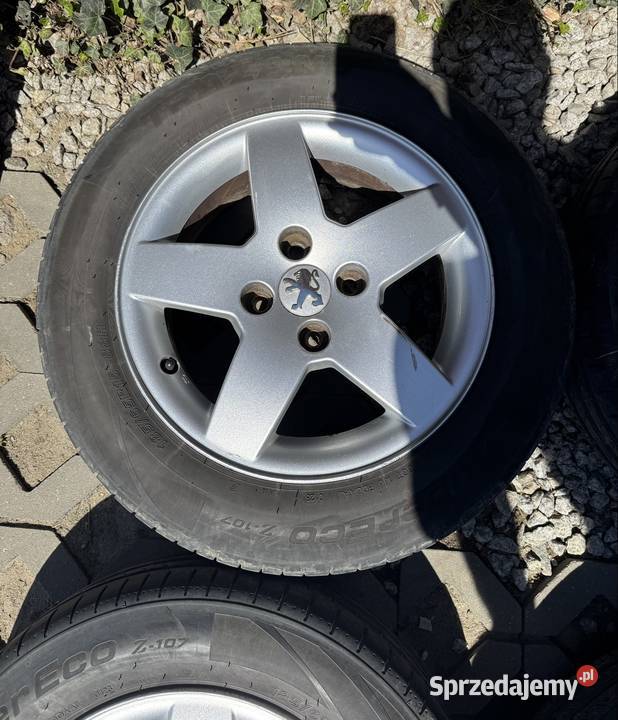 Felgi Peugeot 4x108 opony 1856515 2023r 206 207 Peugeot OE Krępiec