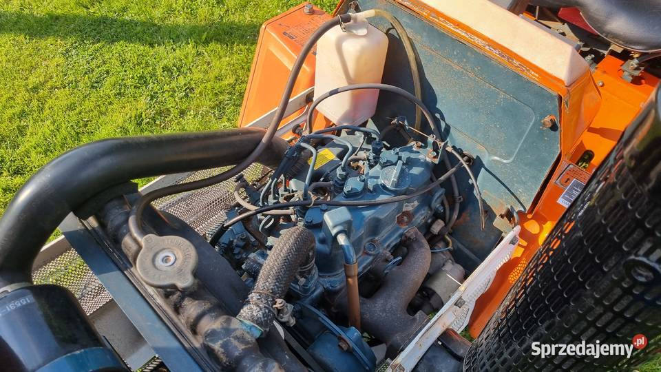 Ciągnik Kubota B1702M z glebogryzarką Bajdy