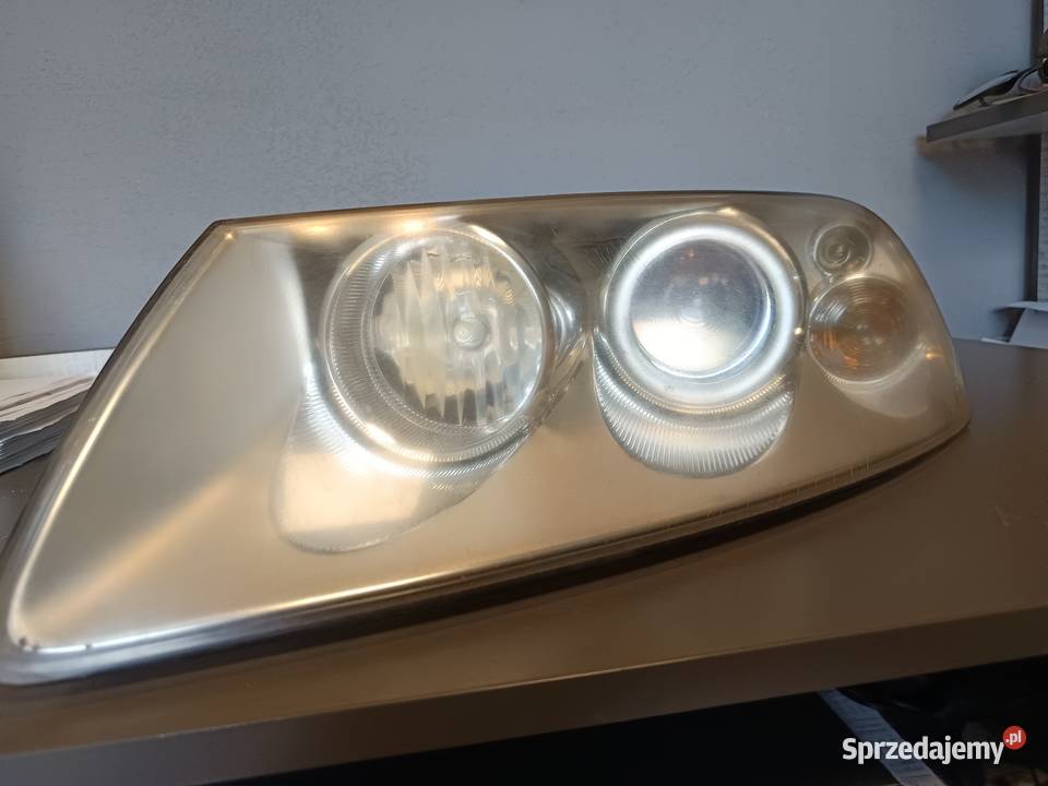 Lampa lewa HALOGEN Touareg I 0206 7L6941015 Lampy przednie Inowrocław