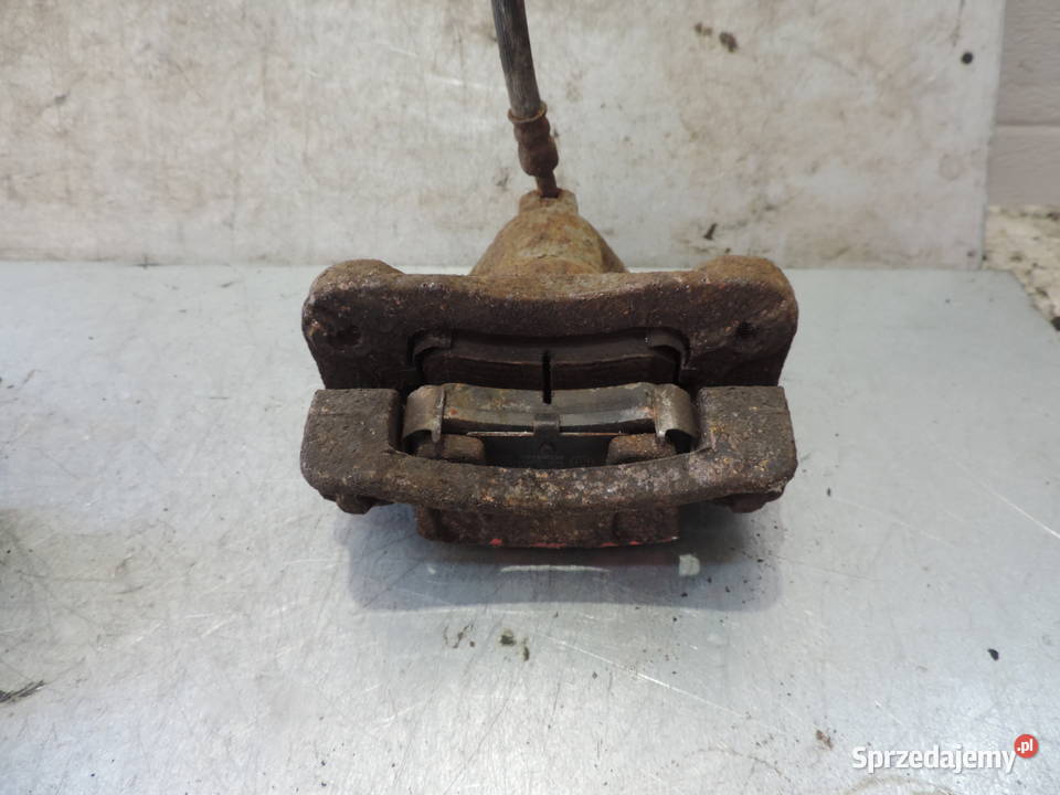 KIA RIO II 0510 ZACISK HAMULCOWY JARZMO LEWY TYŁ Zaciski i jarzma Nowy Sącz