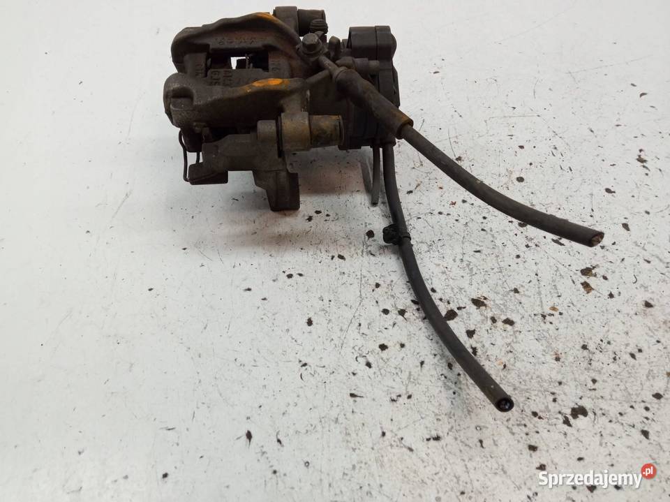 ZACISK HAMULCOWY LEWY TYŁ ELEKTRYCZNY 20 TDI sprzedam