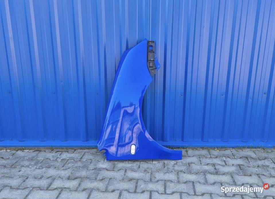 BŁOTNIK PRZÓD PRAWY VW POLO IV 4 OKULAR osobowe Części samochodowe Działoszyce