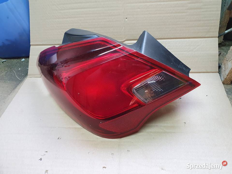 OPEL CORSA E LAMPA LEWA TYLNA LEWY TYŁ 13428447 Międzychód
