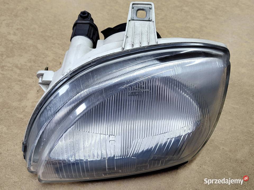 Reflektor lewy Seicento oryginał Carello osobowe Oborniki sprzedam