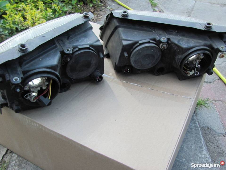 Reflektor lampa VW Passat B5 lewa 9600 u