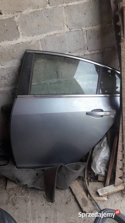 Drzwi opel insignia hb lewy prawy tył 2010r kod łódzkie