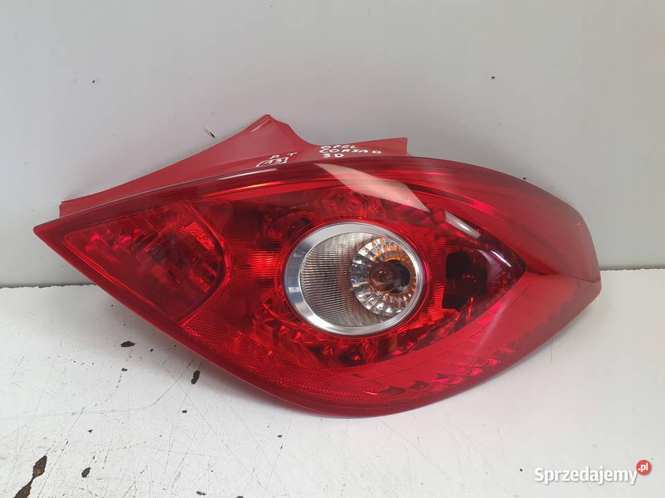 Opel Corsa D 0614r TYLNA TYLNIA LAMPA PRAWA Janów