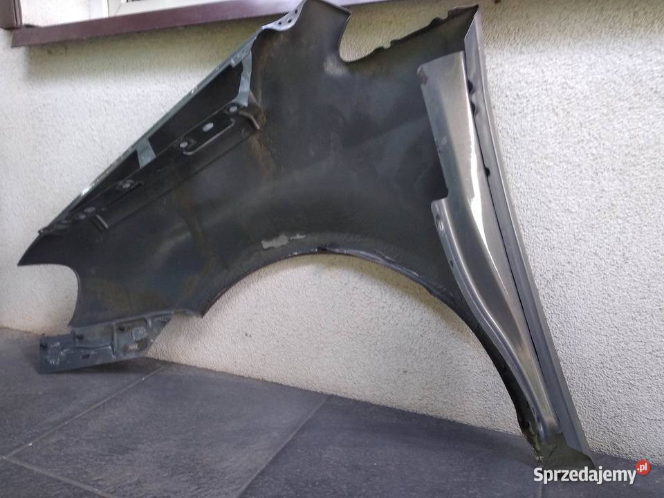 VW Touran 1T0 Caddy błotnik przedni lewy Sieradz