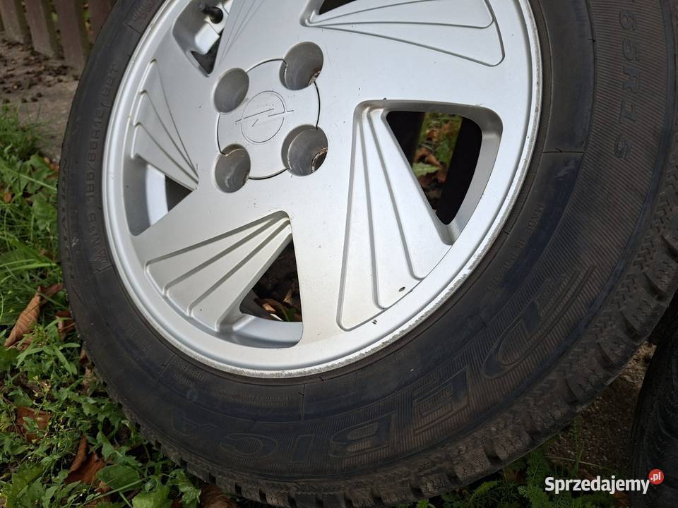 Koła zimowe felgi aluminiowe wiatraki Astra Kamocin sprzedam