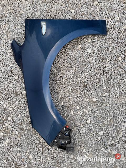 Opel Astra IV Błotnik lewy kod lakieru Z168 osobowe małopolskie