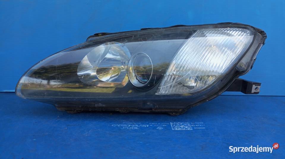 LAMPA LEWY PRZÓD REFLEKTOR EU XENON 10022312 Nowy Tomyśl