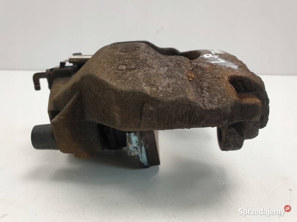 VW Transporter T5 LEWY PRZEDNI ZACISK HAMULCOWY
