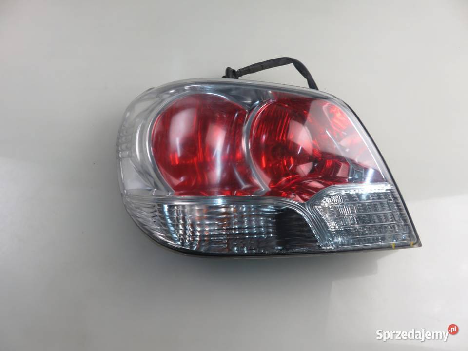 LAMPA LEWA TYLNA MITSUBISHI OUTLANDER I CUW