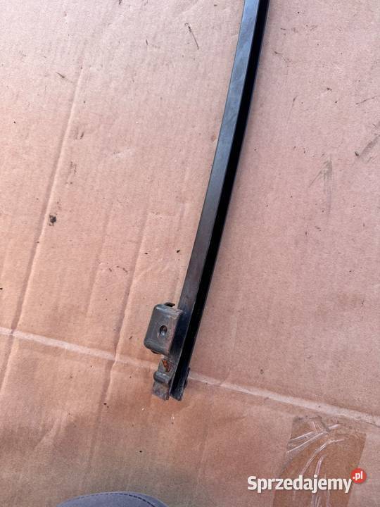Prowadnica wspornik ślizg szyby drzwi lewy tył Brzesko