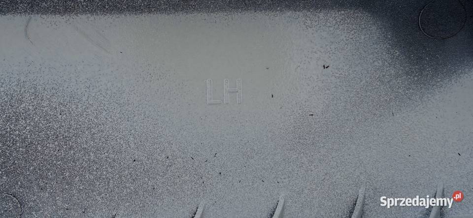 VOLVO FH4 DOKŁADKA ZDERZAKA SPOILER LEWY Z GUMĄ Bieleń