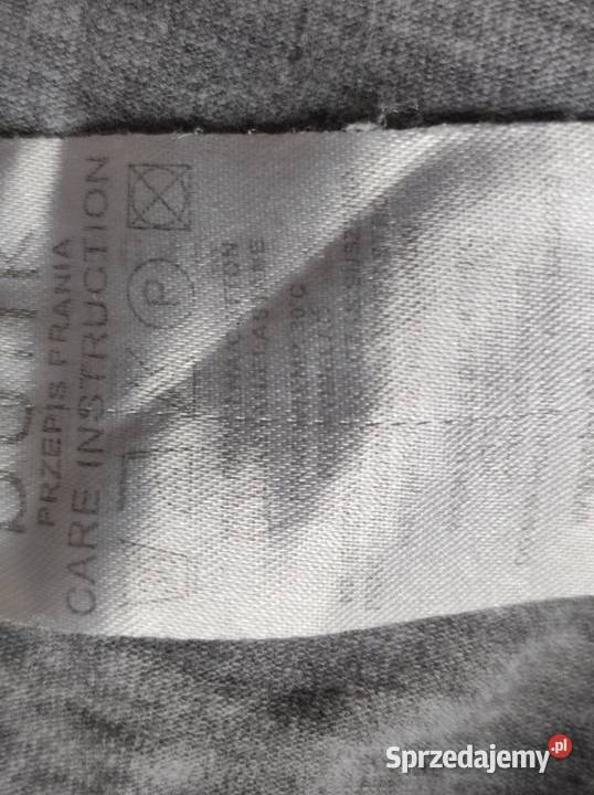 wysokie spodnie sportowe dresowe z zakładanym szary/srebrny Kielce