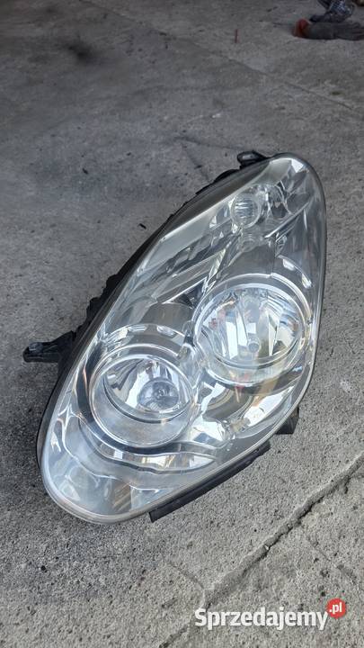 Reflektor lewy lampa lewa Fiat Doblo Opel combo Biała Rawska