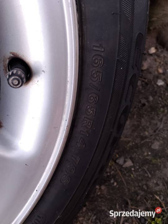 Oryginalne alufelgi Ford z oponami R14 Samochodowe Jędrzejów sprzedam