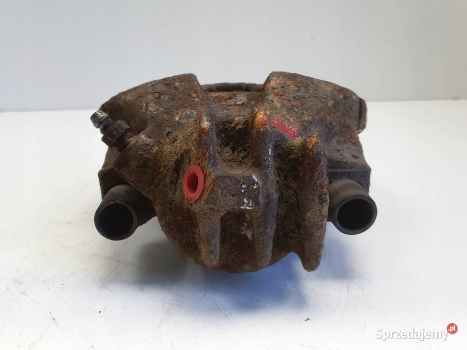 Volvo S60 I V70 II PRZEDNI ZACISK HAMULCOWY lewy Rudka