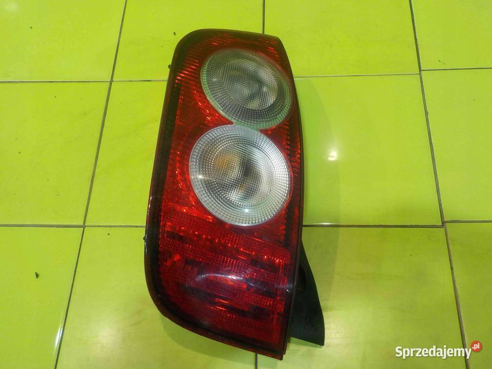 NISSAN MICRA K12 LIFT CC 07r CABRIO lampa lewa Suków