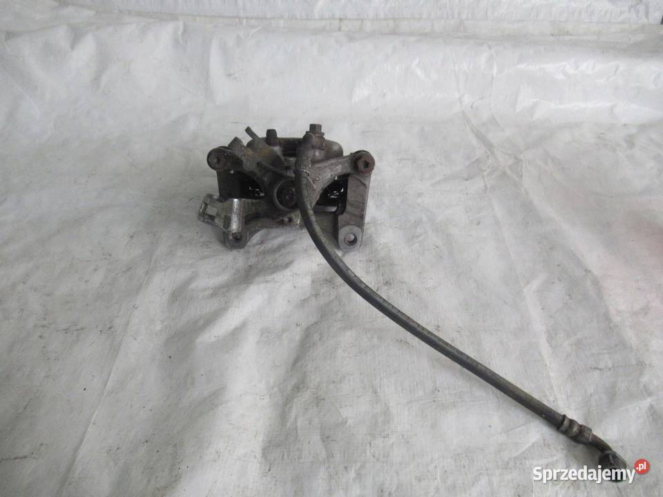 ASTRA K V 5 zacisk hamulcowy prawy tył 39021738