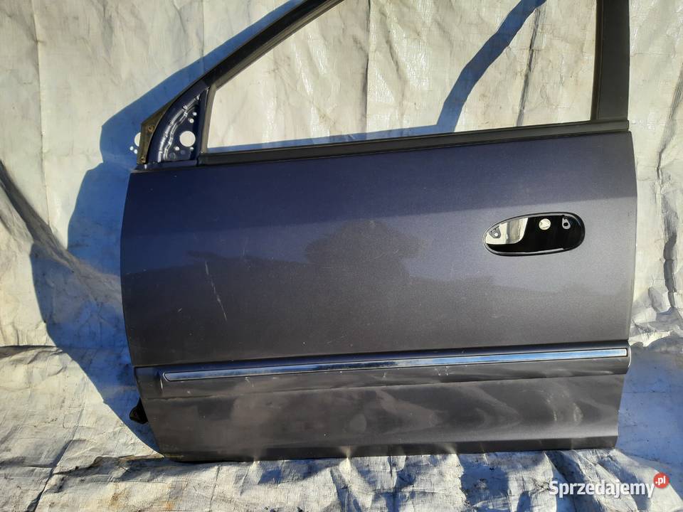 Kia Carens II Drzwi lewe przednie lewy przód Ksawerów