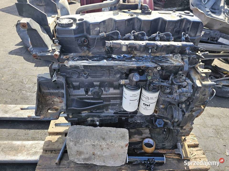 SILNIK SŁUPEK HOLLAND T6175 175 1280376 Pozostałe Motoryzacja Lipno