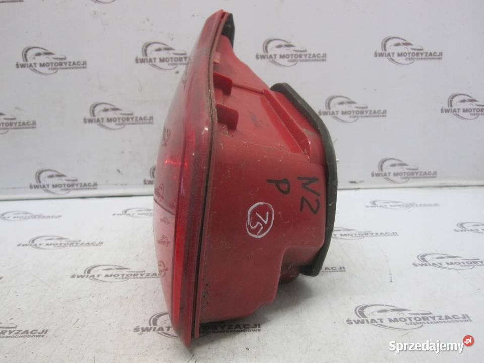 KIA SPORTAGE III 12r lampa prawa tył w klapę Motoryzacja