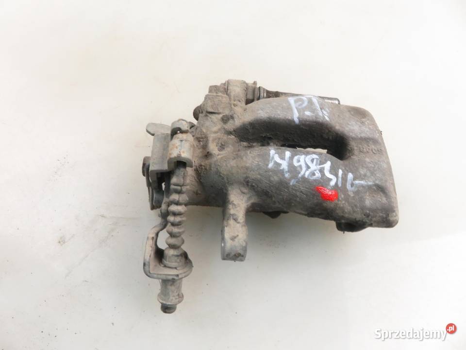 ZACISK PRAWY TYŁ OPEL COMBO C 13 CDTI 16V Z 13 Części samochodowe