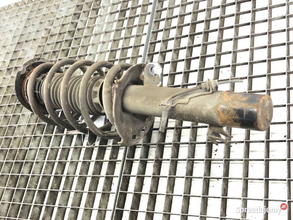 AMORTYZATOR LEWY PRZÓD ZE SPRĘŻYNĄ PEUGEOT 2008