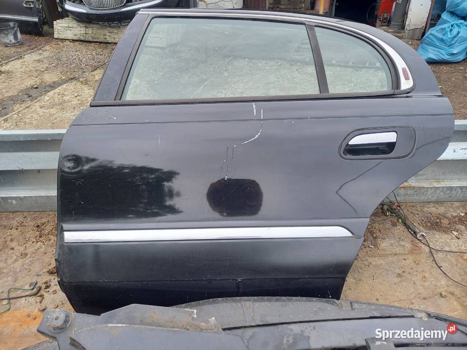Dzwi lewe tylne lincoln continental2000r Sierakowice