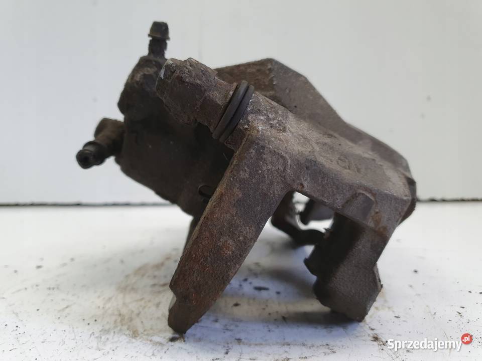 Toyota RAV4 IV V PRZEDNI ZACISK HAMULCOWY lewy osobowe Rudka