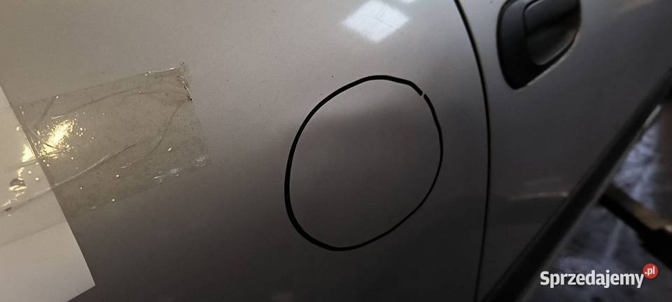 DRZWI PRAWE TYŁ NISSAN ALMERA KL0