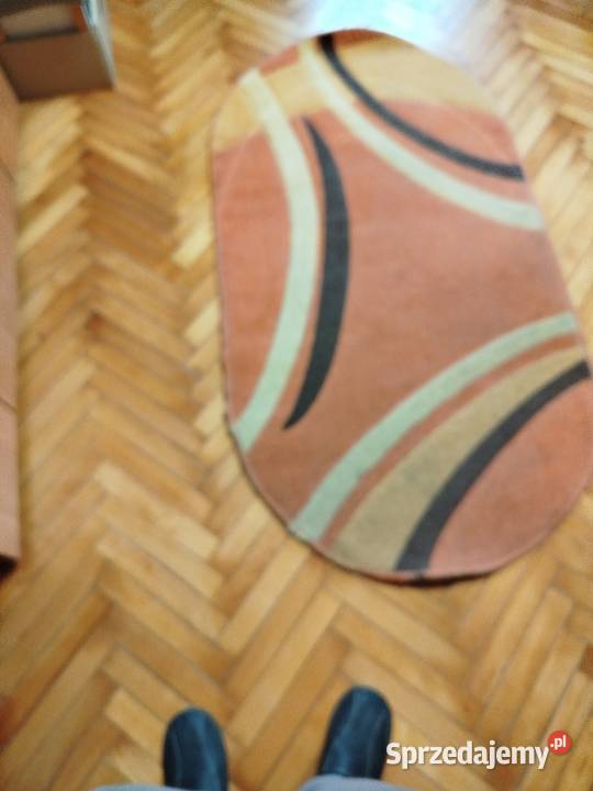 Dywan owalny 150x80 różowopomarańczowy z wzorem Kraków