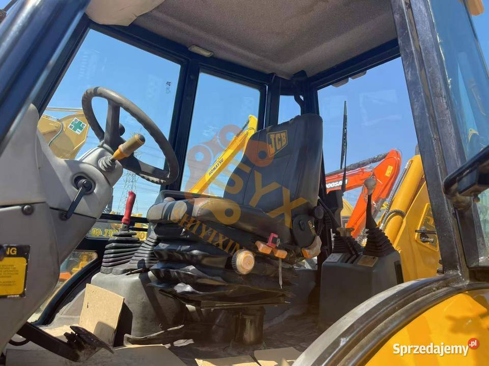 JCB 4 CX Koparko ładowarki Łopienno