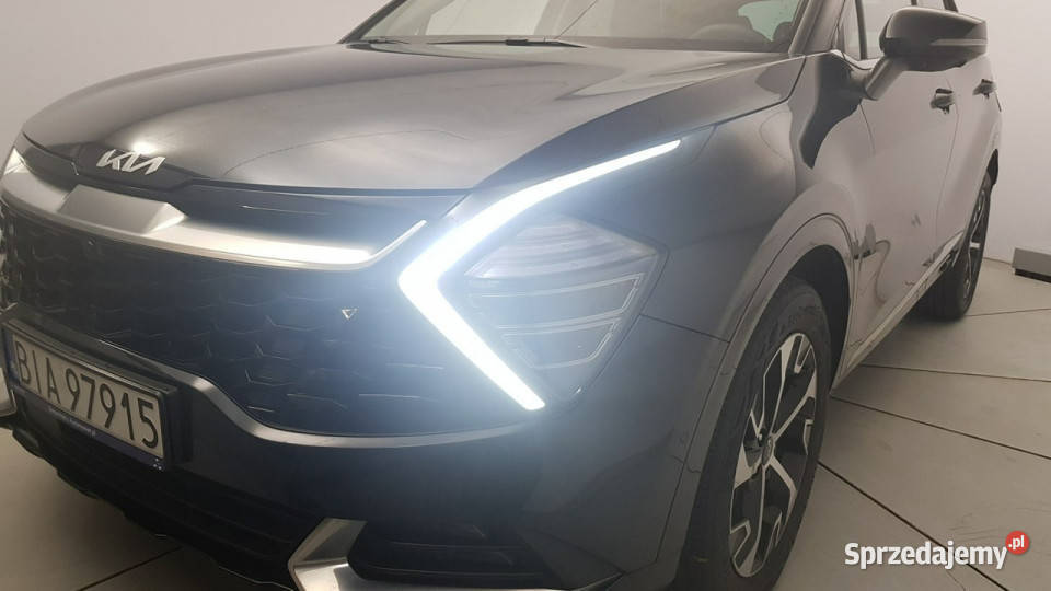 Kia Sportage 16 TGDI HEV Business Line 4WD Salon autoalarm Warszawa