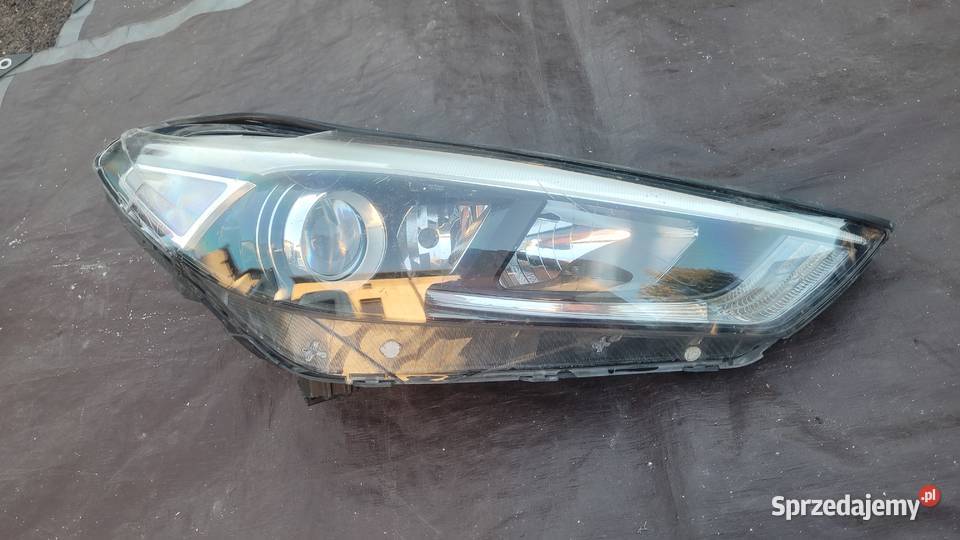 HYUNDAI TUCSON III 15 PRAWY REFLEKTOR PRAWA