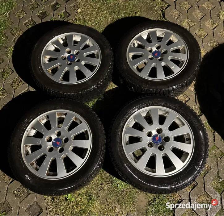 Felgi Saab 5x110 opony zima 2055516 93 95 Opel Krępiec