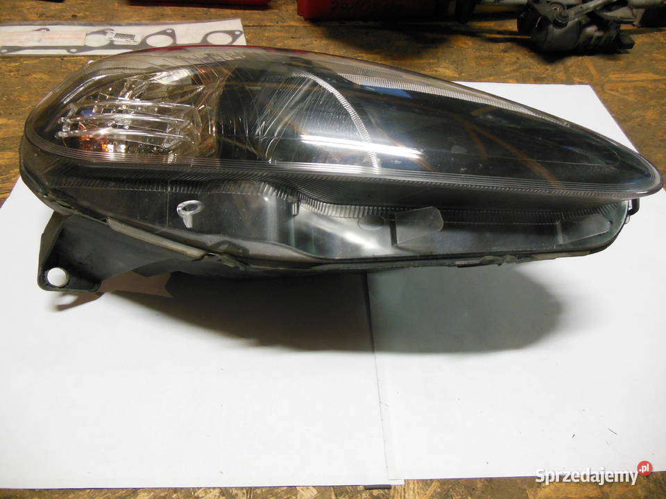 REFLEKTOR PRAWY FIAT GRANDE PUNTO 086611164R Kozy